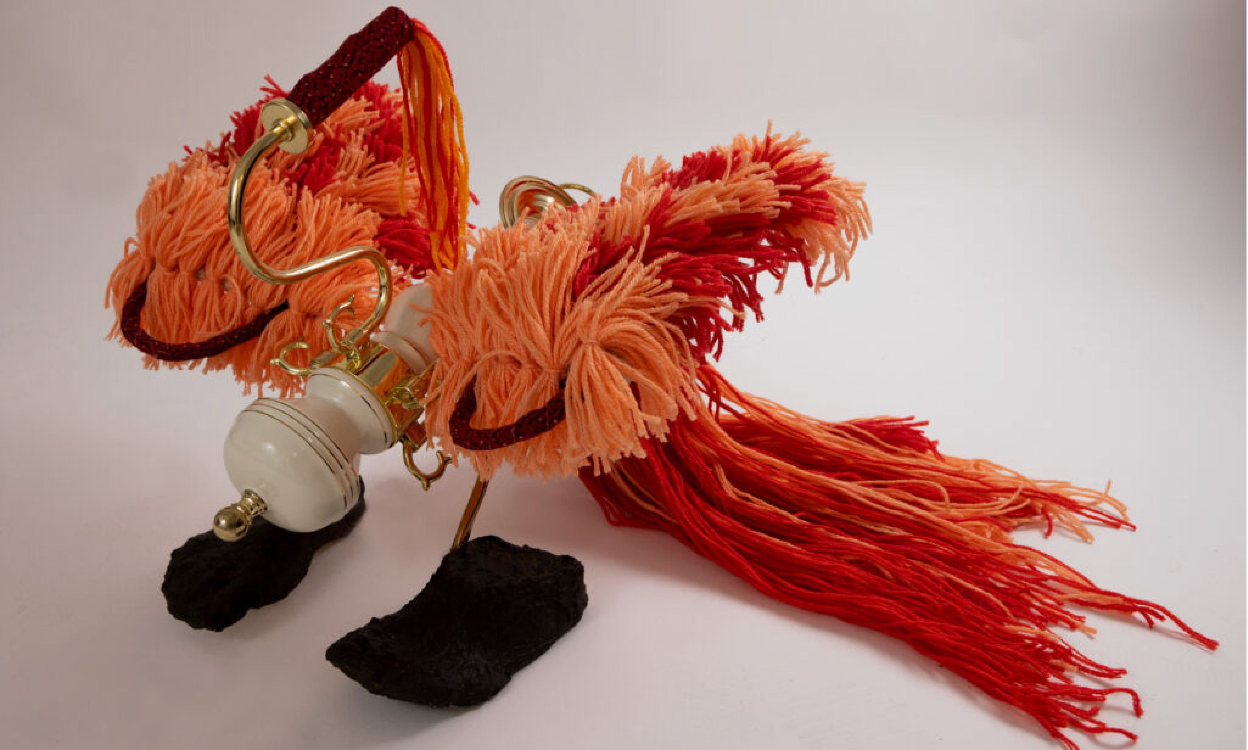 Yulin Yuan, ZhuQue. Chandelier, casted feet, yarn, fabric 20"x30."