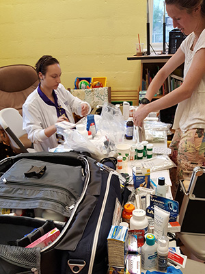 PHOTO: students packing supplies