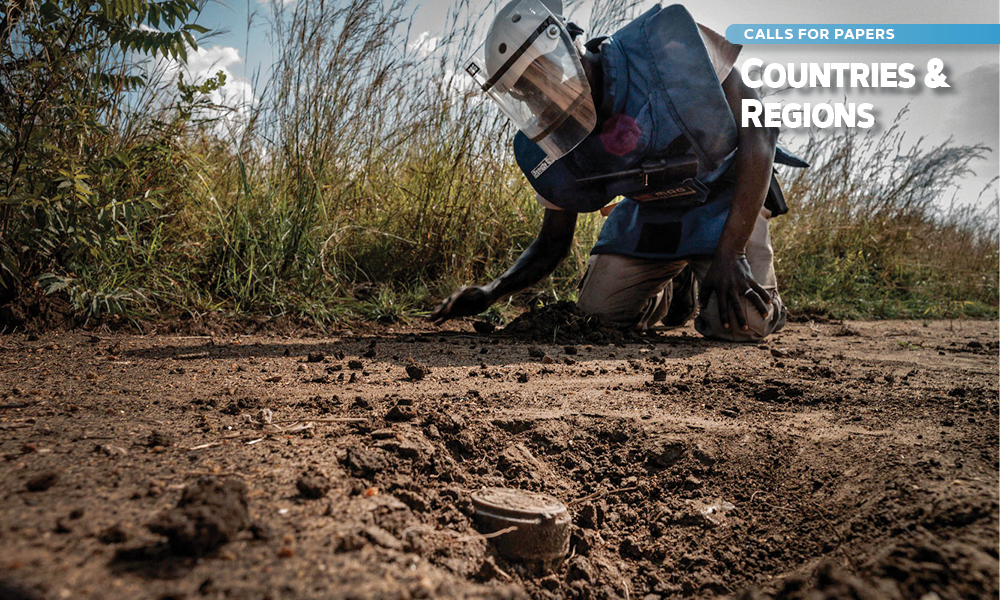 A deminer wearing blue personal protective equipment; superimposed text reads "Countries & Regions".