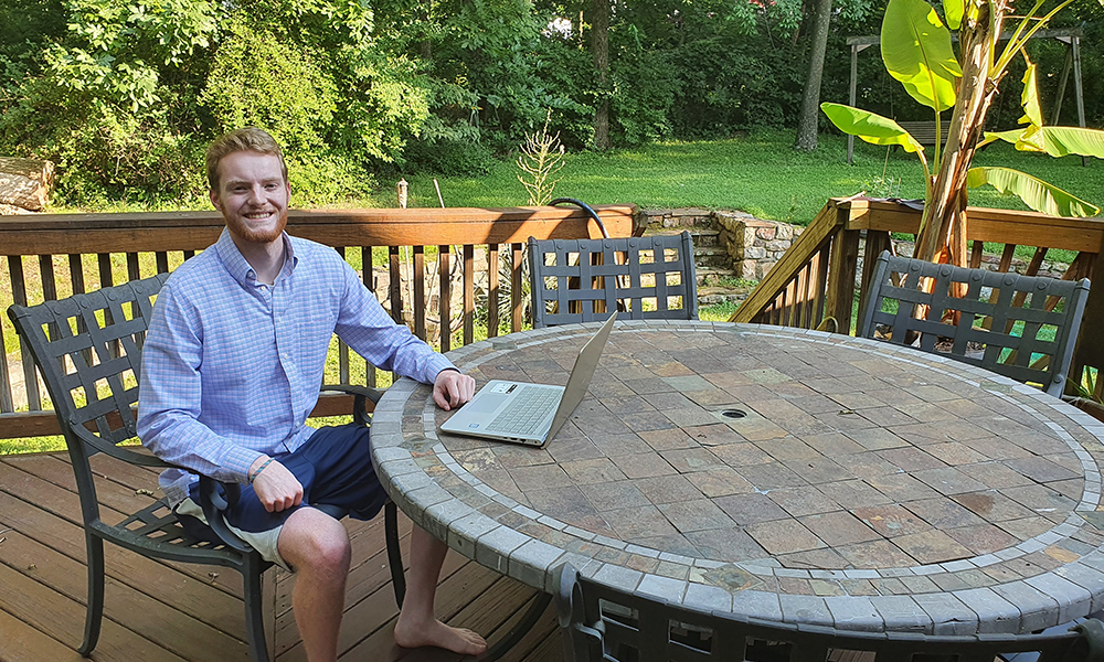 CIS major Wes Jamison in his deck office while participating in a virtual internship - 2020