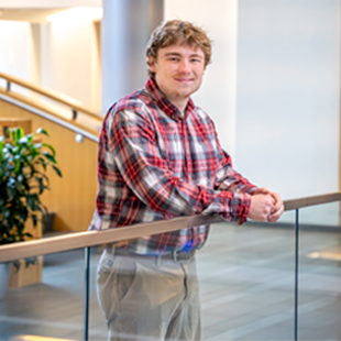 Headshot of Berkley Smith, a current student majoring in Economics and psychology.