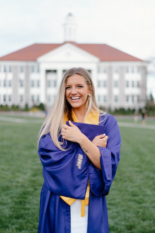 Emma Wiltz in commencement cap and gown