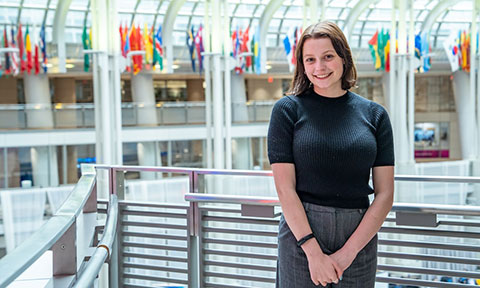 Portrait of Mia Buswell, a JMU student, at her internship in Washington, DC.