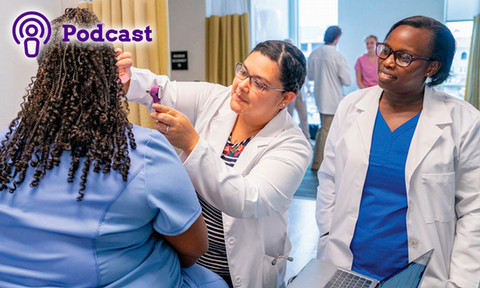 Students working in a nursing lab