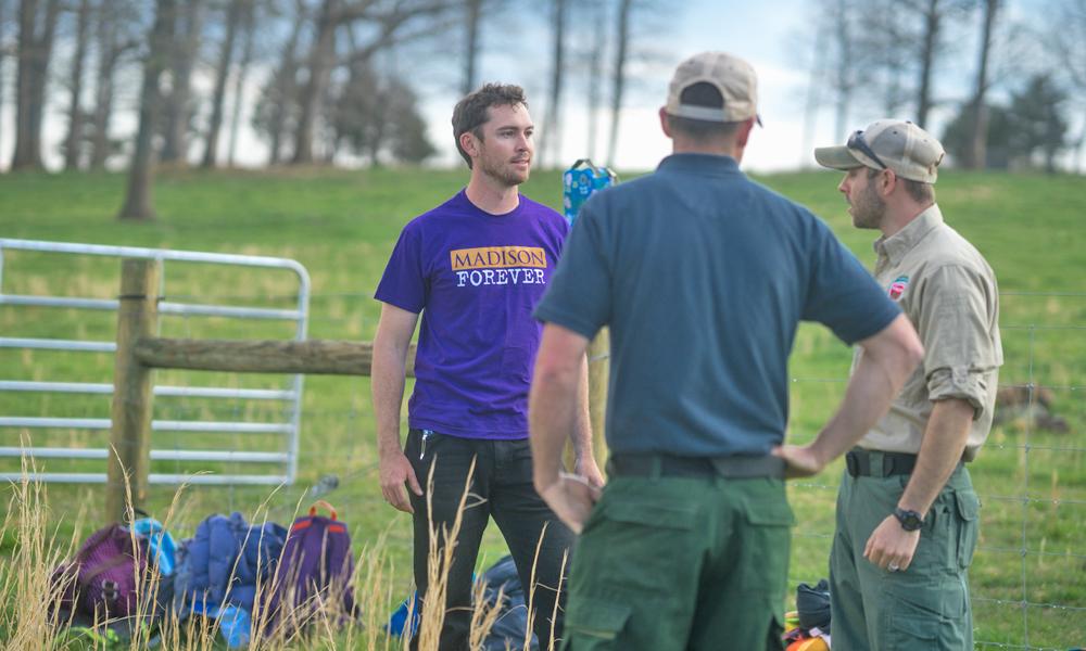 Adam Lynch chats with other farm conservation experts