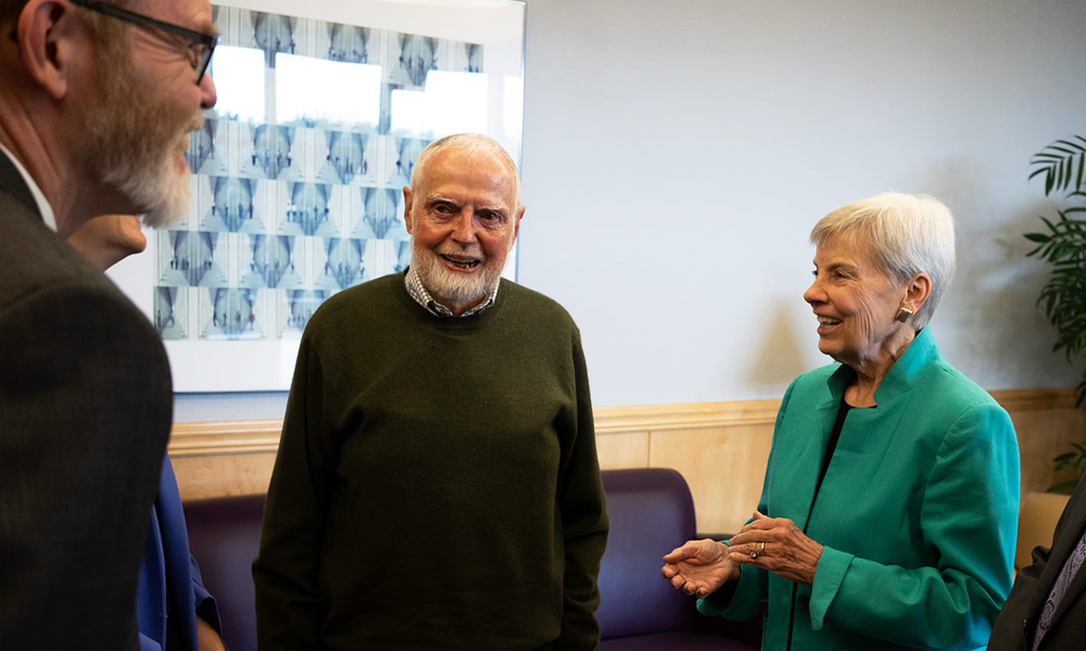 Bob Kolvoord and the Joneses engaged in conversation.