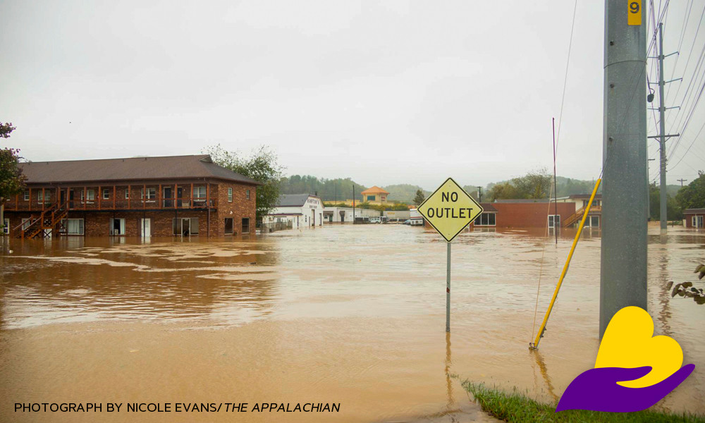 A photo of high water flooding the streets of Appalachian State University. 