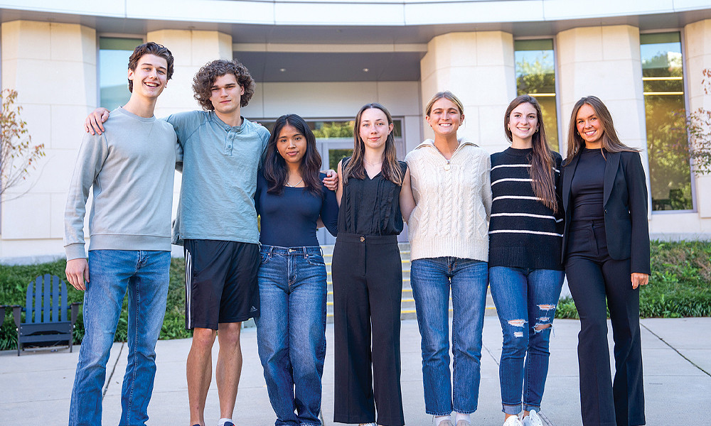 cohort of students in front of Hartman Hall