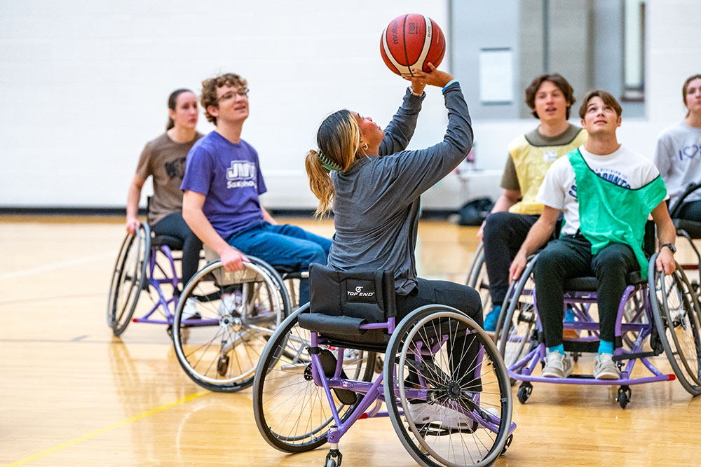 students playing wheelchair basketball