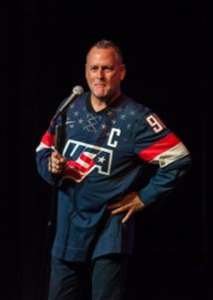 Here is Dave Coulier laughing along with one of his jokes.