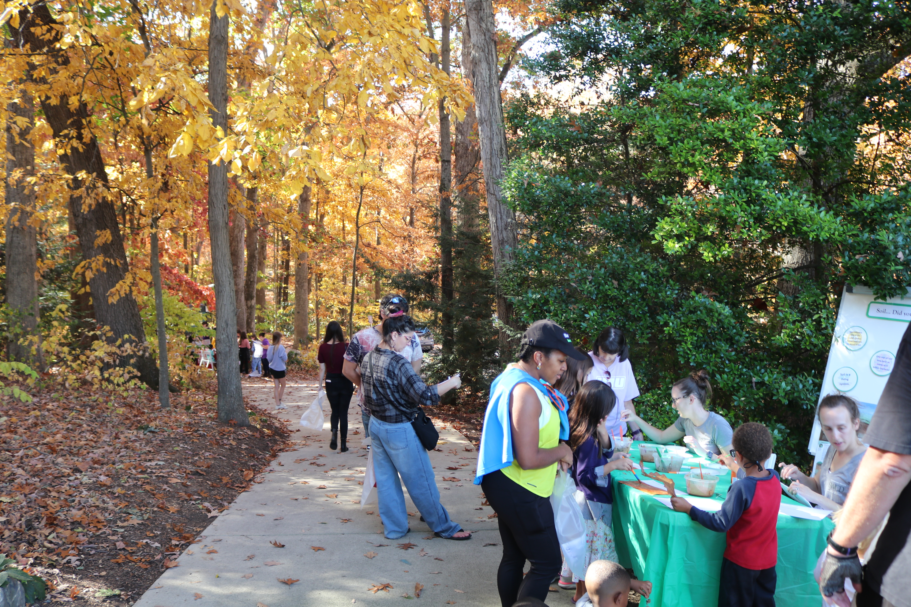 people enjoying Harvest Festival at the Arboretum
