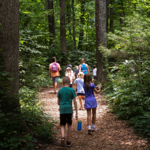 family walking along Arboretum trail