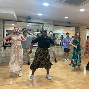 Students practice Flamenco dancing in Spain.