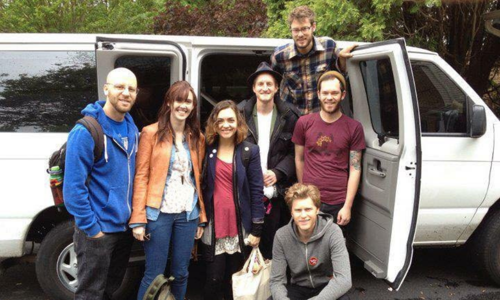 Dan Gorin, left, (JMU '11) Tour and Merchandising manager for The Lumineers